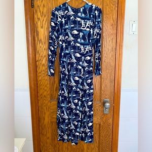 Reformation dress with peepholes in the back and high slit!